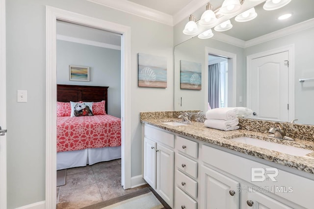 ensuite bathroom with ensuite bath, crown molding, and a sink