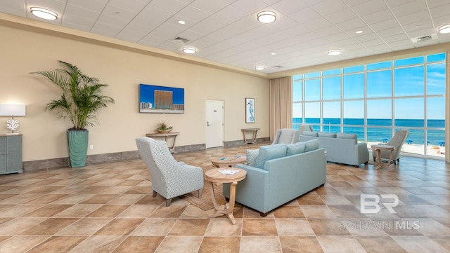 building lobby with a water view and visible vents
