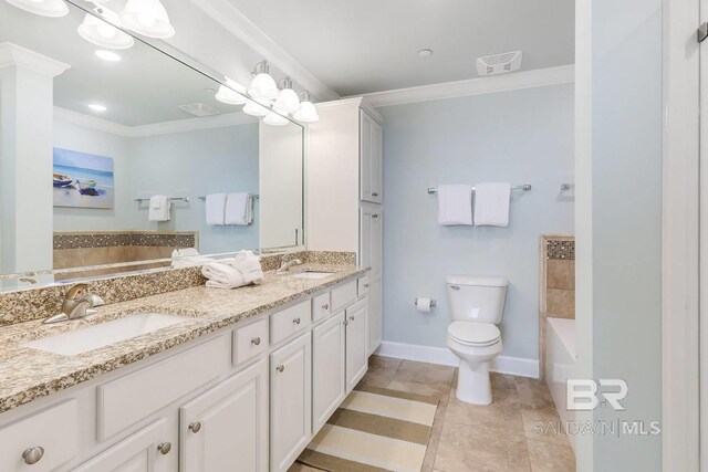 bathroom with crown molding, visible vents, and a sink