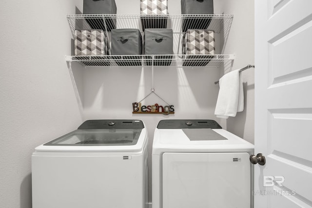 laundry room featuring laundry area and washing machine and dryer
