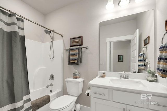 full bathroom featuring vanity, toilet, and shower / bath combination with curtain