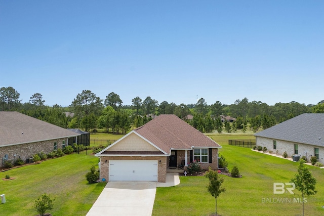 view of front of home with fence, a front yard, brick siding, concrete driveway, and an attached garage