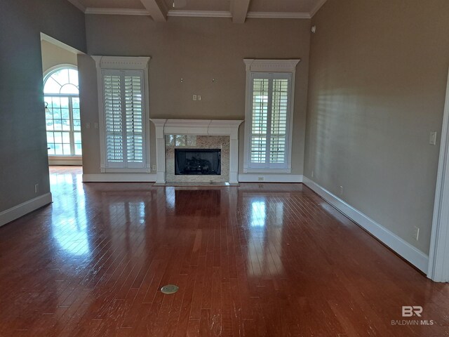 living room featuring wood-type flooring, ornamental molding, and ceiling fan