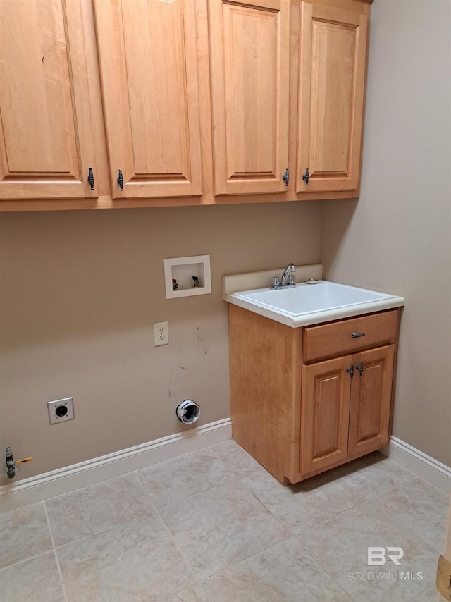 laundry room featuring washer hookup, cabinets, sink, electric dryer hookup, and gas dryer hookup