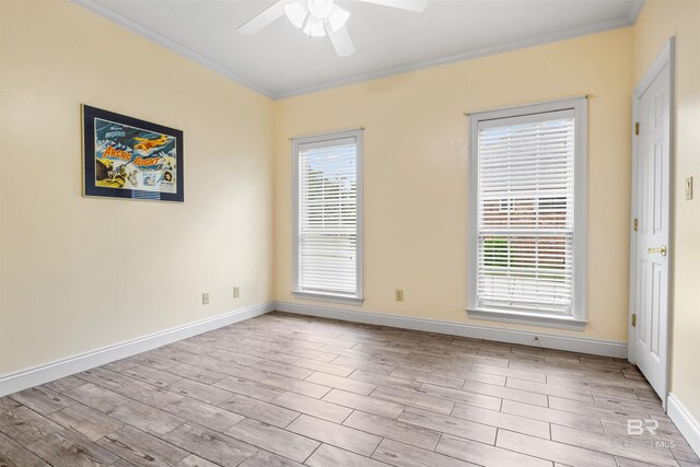 interior details with an inviting chandelier, a tray ceiling, and crown molding