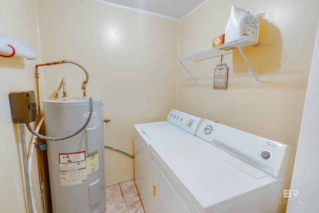 clothes washing area with water heater, washer and clothes dryer, and crown molding