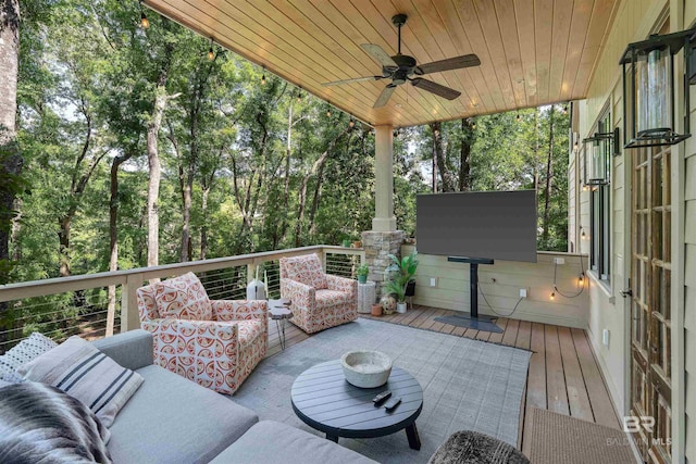 wooden deck featuring ceiling fan and an outdoor hangout area