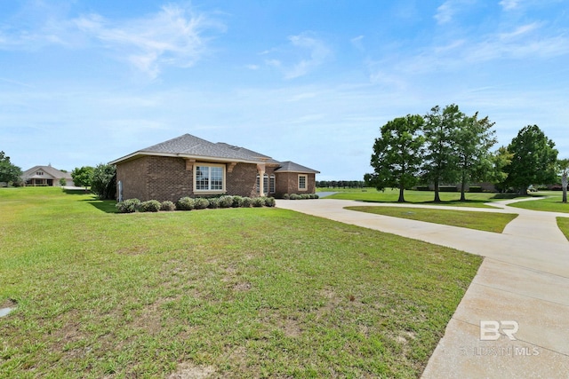 ranch-style house with a front lawn