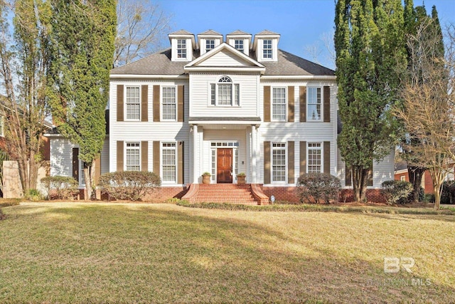 view of front facade with a front lawn