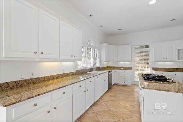 kitchen with white cabinetry, ornamental molding, stone countertops, and black gas stovetop