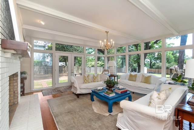 41 Yester Pl, Mobile, AL 36608 - sunroom / solarium with beam ceiling, wood finished floors, an inviting chandelier, and french doors