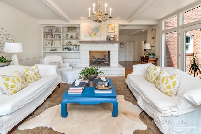 41 Yester Pl, Mobile, AL 36608 - living room featuring beamed ceiling, an inviting chandelier, and a brick fireplace