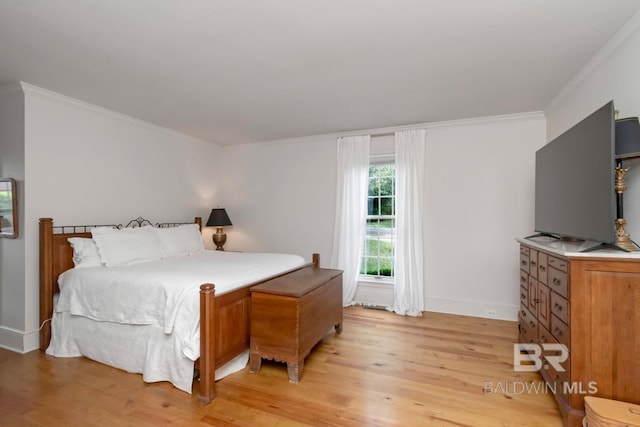 41 Yester Pl, Mobile, AL 36608 - bedroom with ornamental molding, light wood finished floors, and baseboards