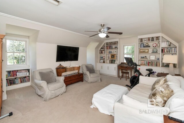 41 Yester Pl, Mobile, AL 36608 - living room featuring carpet flooring, built in shelves, ceiling fan, visible vents, and ornamental molding