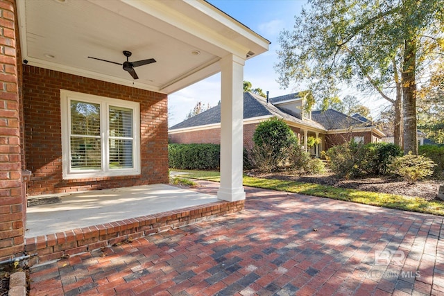 view of patio featuring ceiling fan