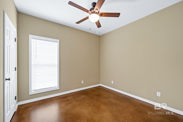 unfurnished room with ceiling fan