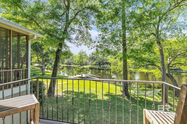 balcony featuring a water view