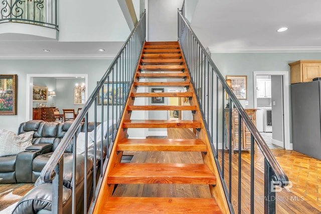 staircase featuring recessed lighting and ornamental molding