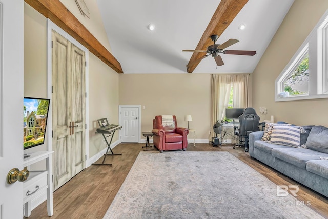 living room featuring vaulted ceiling with beams, wood finished floors, recessed lighting, and ceiling fan