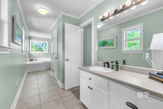 bathroom featuring a healthy amount of sunlight, tile patterned floors, and baseboards