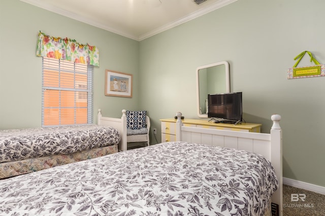 bedroom with carpet and crown molding