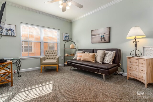 living room featuring carpet flooring, ornamental molding, and ceiling fan