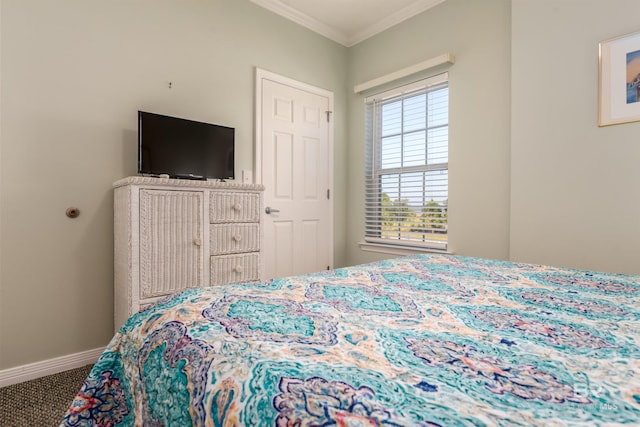 bedroom with carpet floors and ornamental molding