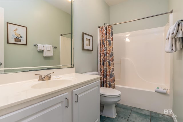 full bathroom with vanity, shower / tub combo, toilet, and tile patterned flooring