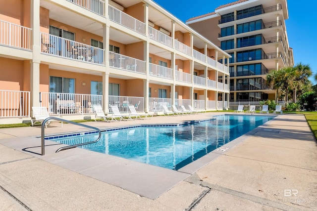 view of pool with a patio area