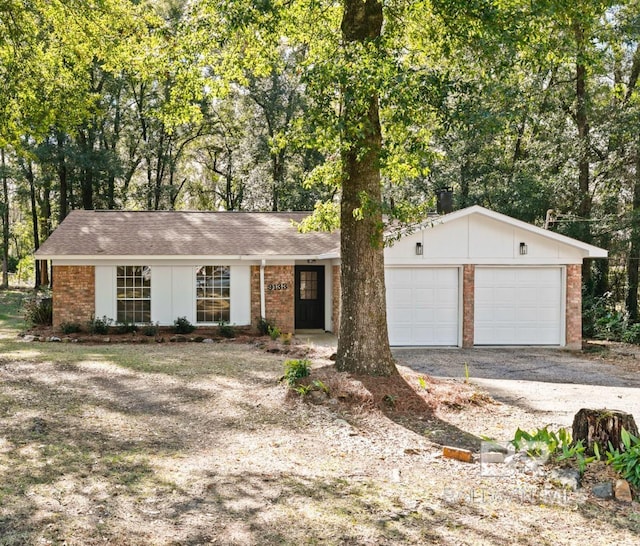 single story home with a garage