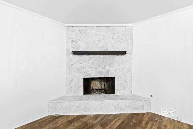 details featuring wood-type flooring, a fireplace, and ornamental molding