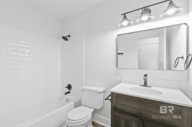 full bathroom featuring vanity, washtub / shower combination, and toilet