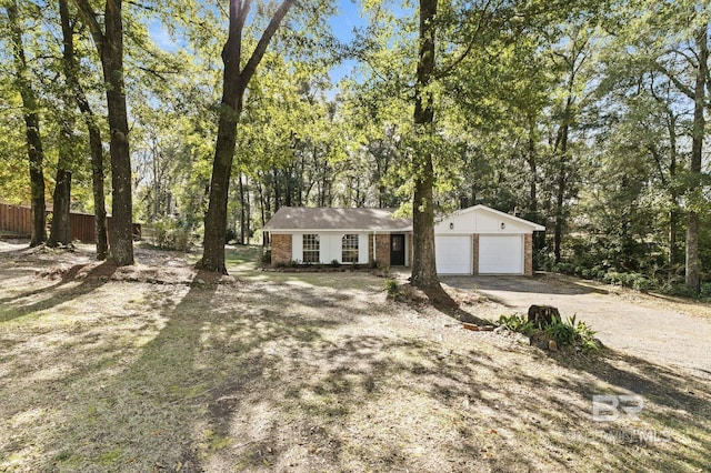 single story home with a garage