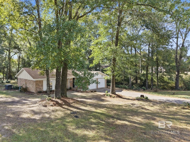 view of yard featuring a garage