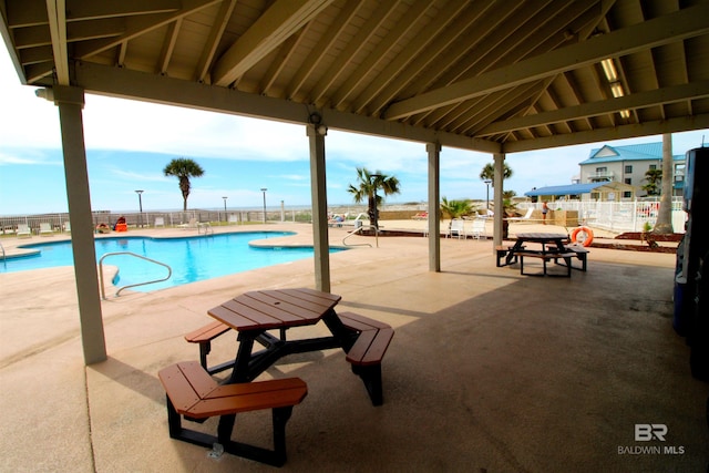 view of pool featuring a gazebo and a patio area