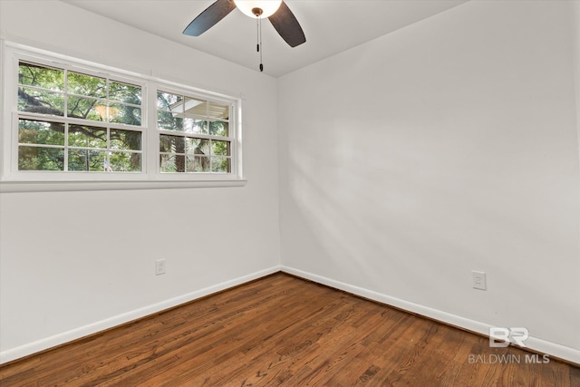 empty room featuring ceiling fan and wood-type flooring