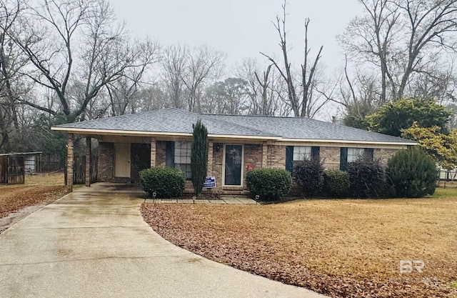 single story home with a carport