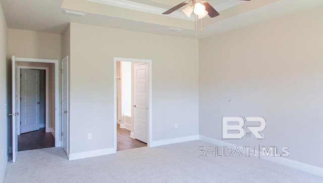 unfurnished bedroom with carpet and ceiling fan