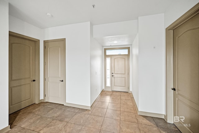 interior space featuring light tile floors