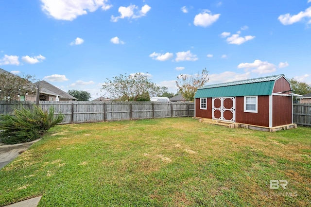 view of yard with a storage unit