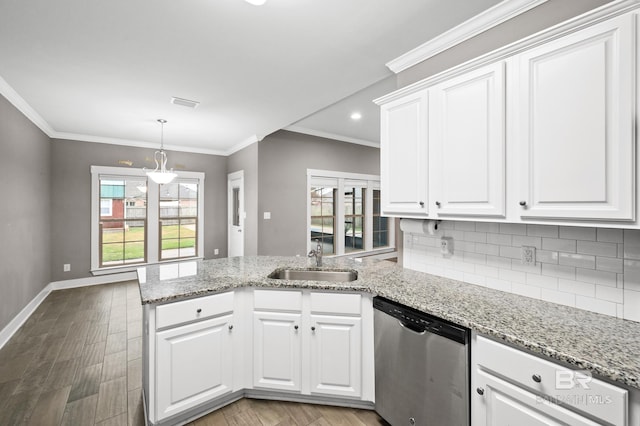 kitchen with dishwasher, white cabinets, and sink