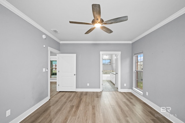 unfurnished room with ceiling fan, ornamental molding, and light hardwood / wood-style flooring