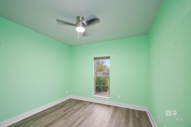 unfurnished room with light wood-type flooring and ceiling fan