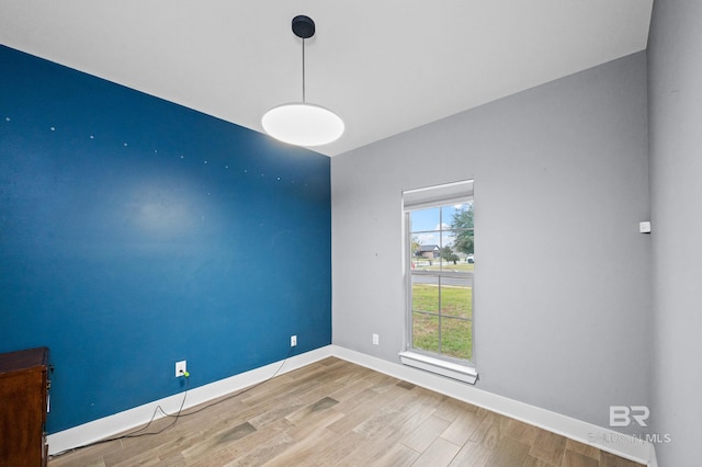 empty room featuring hardwood / wood-style floors