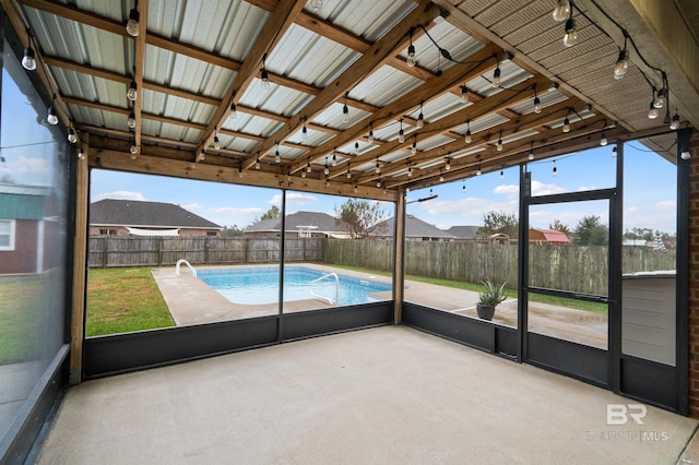 unfurnished sunroom with a healthy amount of sunlight