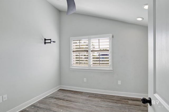 empty room with wood-type flooring