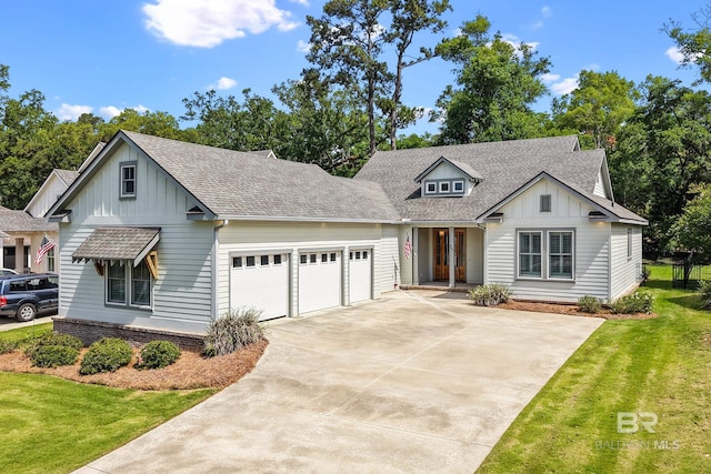 467 Colony Dr, Fairhope, AL 36532 - modern farmhouse style home featuring board and batten siding, a garage, roof with shingles, and concrete driveway