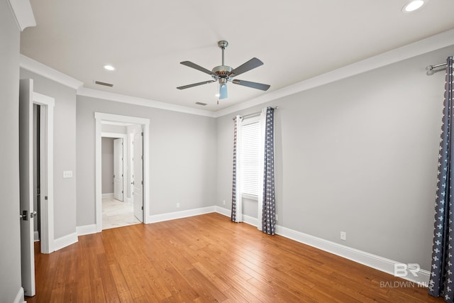 467 Colony Dr, Fairhope, AL 36532 - spare room with a ceiling fan, recessed lighting, baseboards, light wood-type flooring, and ornamental molding