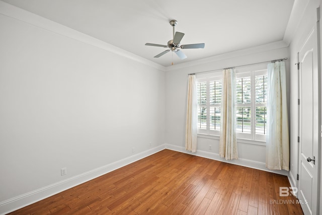 467 Colony Dr, Fairhope, AL 36532 - spare room featuring ceiling fan, hardwood / wood-style flooring, baseboards, and crown molding