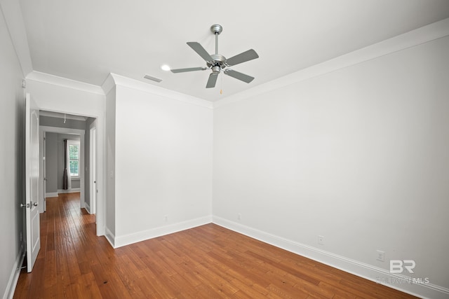 467 Colony Dr, Fairhope, AL 36532 - empty room with baseboards, wood-type flooring, ornamental molding, and a ceiling fan